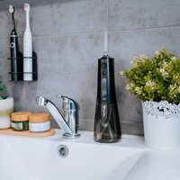 Ирригатор  TrueLife AquaFloss Compact L100 (черный) - Превью изображения №11 — Интернет-магазин Your Sale